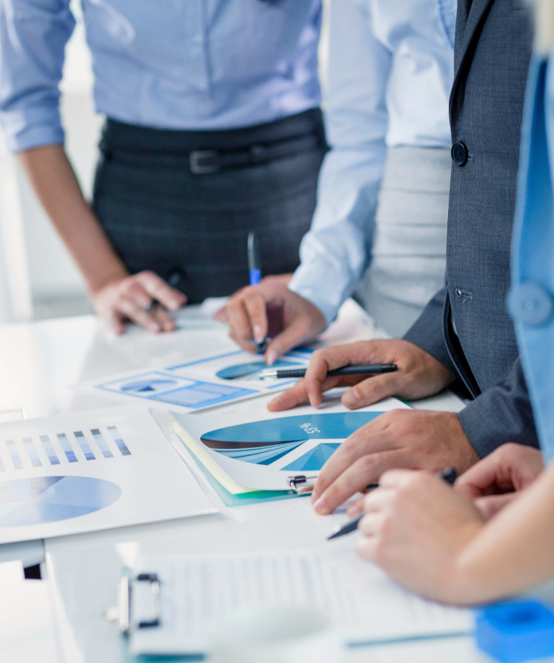 A team reviews asset reports.