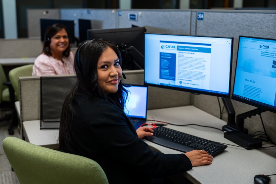 Female technicians work together at workstations Female technicians work together at workstations