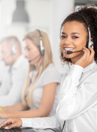 Call center worker accompanied by her team