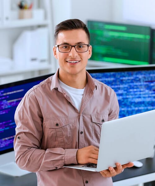 Technician working at his laptop