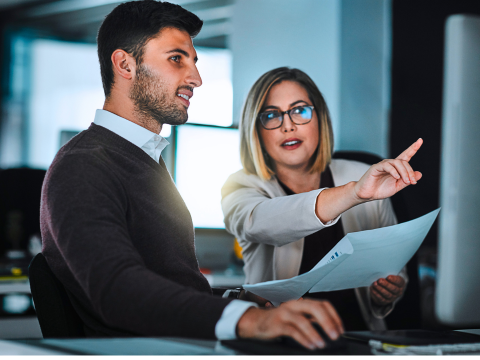 Colleagues review and discuss information